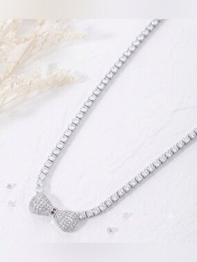 Pavé Bow Tennis Necklace in White with Red Accent